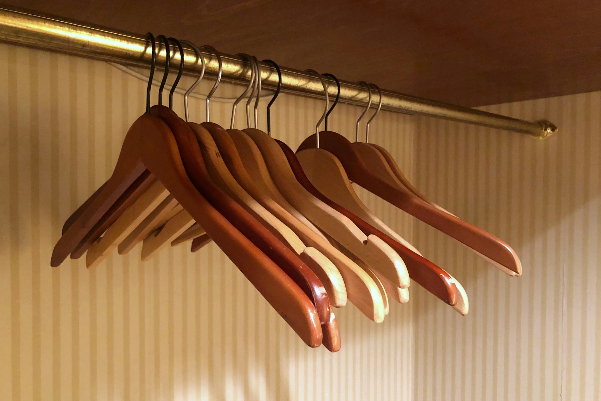 Wooden coat hangers in the closet
